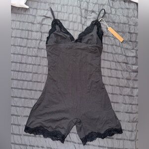 Skims Fits Everybody Lace Triangle Onesie